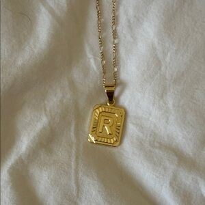 BRACHA gold initial necklace. Letter R.